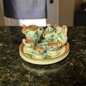 Pottery mini tea set and porcelain ballerina
